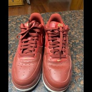 red men nikes size 8